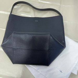 The Row black bucket bag